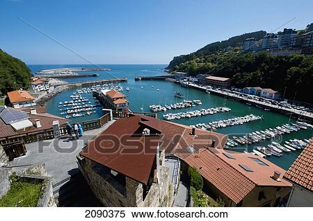 Boats In Mutriku's Port, Mutriku, Basque Country, Spain View Large Photo Image Stock Photography - Boats In Mutriku's Port, Mutriku, Basque Country, Spain. Fotosearch