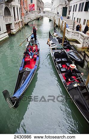 Boats in the canal; Venice, Italy View Large Photo Image Stock Photograph - Boats in the canal; Venice, Italy. Fotosearch