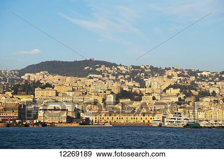 Boats in the harbour and buildings on the waterfront; Genoa, Liguria, Italy View Large Photo Image Stock Photo - Boats in the harbour and buildings on the waterfront; Genoa, Liguria, Italy. Fotosearch