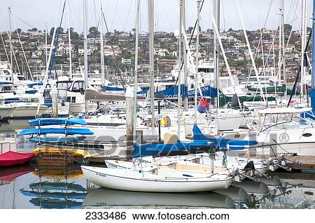 Stock Photograph - Boats In The Harbour And Houses On A Hill; San Diego, California, United States Of America. Fotosearch