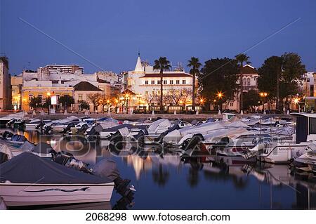 Boats In The Harbour Reflected In The Water At Night; Faro Algarve Portugal View Large Photo Image Stock Photo - Boats In The Harbour Reflected In The Water At Night; Faro Algarve Portugal. Fotosearch