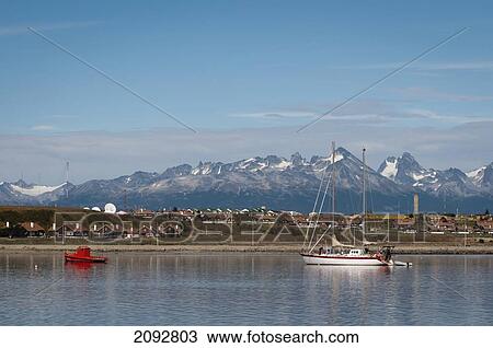 Boats In The Harbour; Ushuaia, Tierra Del Fuego, Argentina View Large Photo Image Stock Image - Boats In The Harbour; Ushuaia, Tierra Del Fuego, Argentina. Fotosearch
