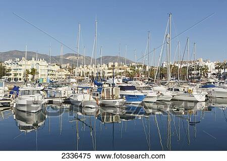 Boats In The Marina; Benalmadena Costa, Costa Del Sol, Malaga Province, Andalusia, Spain View Large Photo Image Stock Photography - Boats In The Marina; Benalmadena Costa, Costa Del Sol, Malaga Province, Andalusia, Spain. Fotosearch