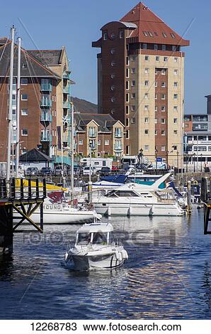 Stock Image - Boats in the marina; Swansea, Wales. Fotosearch
