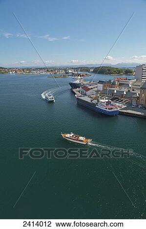Stock Image - Boats in the Stavanger peninsula; Stavanger, Norway. Fotosearch