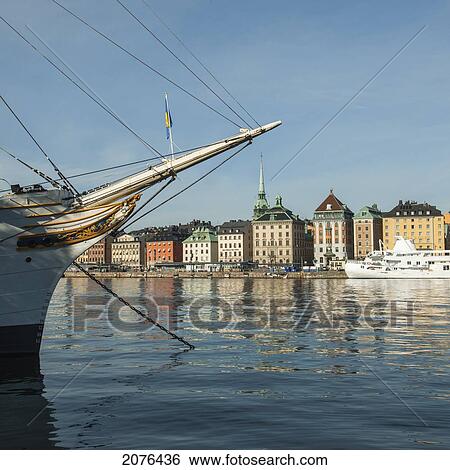 Stock Photograph - Boats In The Water And Buildings Along The Shoreline; Stockholm Sweden. Fotosearch