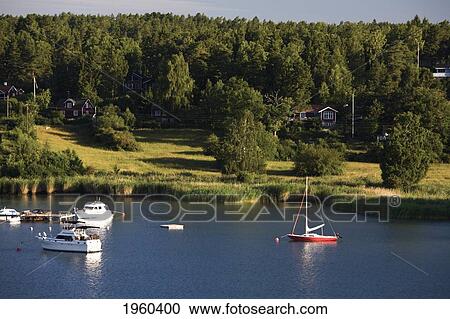 Boats In The Water At The Entrance To The Fjord; Stockholm, Sweden View Large Photo Image Stock Image - Boats In The Water At The Entrance To The Fjord; Stockholm, Sweden. Fotosearch