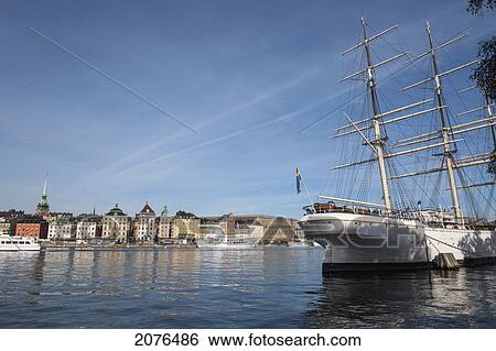 Stock Photograph - Boats In The Water With View Of Buildings Across The Water; Stockholm Sweden. Fotosearch