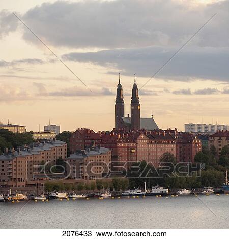 Boats Moored Along The Water's Edge At Sunset; Stockholm Sweden View Large Photo Image Stock Image - Boats Moored Along The Water's Edge At Sunset; Stockholm Sweden. Fotosearch