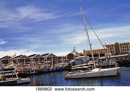 Stock Image - Boats Moored At Victoria Harbor. Fotosearch