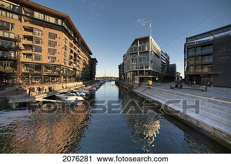 Boats Moored In A Canal With Residential Buildings; Oslo Norway View Large Photo Image Stock Image - Boats Moored In A Canal With Residential Buildings; Oslo Norway. Fotosearch