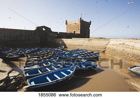Stock Photograph - Boats Moored In Harbor, Port Skala, Essaouira, Morocco. Fotosearch