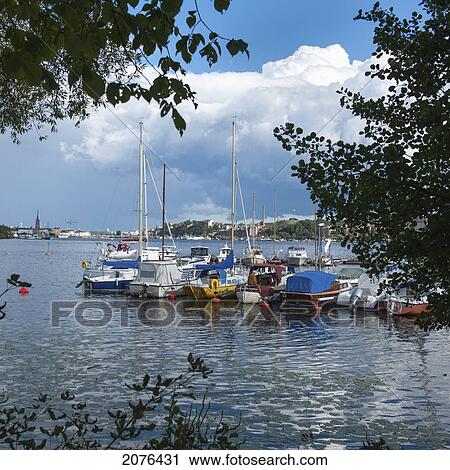 Stock Image - Boats Moored In The Harbour; Stockholm Sweden. Fotosearch