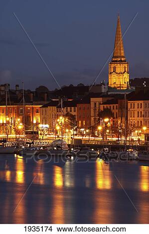 Picture - Boats Moored On River Suir At City Waterfront At Night; Waterford City, County Waterford, Ireland. Fotosearch