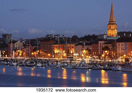 Boats Moored On River Suir At City Waterfront At Night; Waterford City, County Waterford, Ireland View Large Photo Image Stock Image - Boats Moored On River Suir At City Waterfront At Night; Waterford City, County Waterford, Ireland. Fotosearch