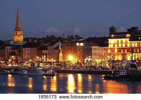 Boats Moored On River Suir At City Waterfront At Night; Waterford City, County Waterford, Ireland View Large Photo Image Stock Image - Boats Moored On River Suir At City Waterfront At Night; Waterford City, County Waterford, Ireland. Fotosearch