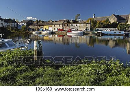 Stock Photo - Boats Moored On The River Barrow; Graiguenamanagh, County Kilkenny, Ireland. Fotosearch