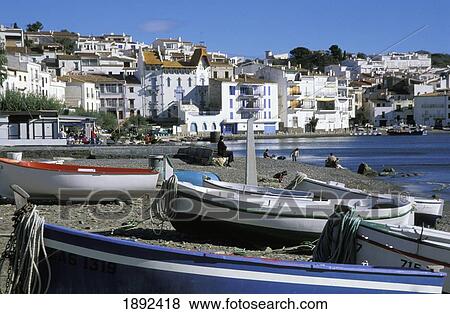 Stock Photo - Boats On Beach And Townscape. Fotosearch