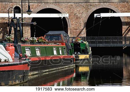 Stock Image - Boats On Canal In Castlefield Basin. Fotosearch