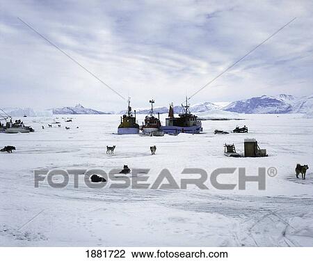 Stock Image - Boats On Frozen Sea. Fotosearch