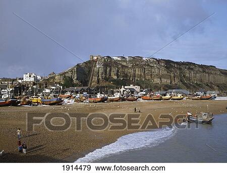 Stock Photo - Boats On The Beach; Hastings, East Sussex. Fotosearch