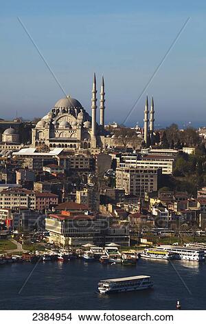 Picture - Boats on the Bosphorus with an islamic mosque in the distance; Istanbul, Turkey. Fotosearch
