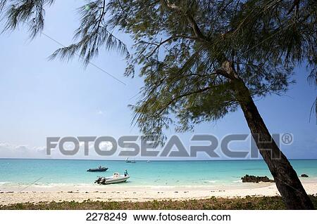 Stock Photo - Boats on the turquoise Indian Ocean; Mozambique. Fotosearch