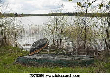 Boats On Totoriskes Lake, Trakai, Lithuania View Large Photo Image Stock Photograph - Boats On Totoriskes Lake, Trakai, Lithuania. Fotosearch