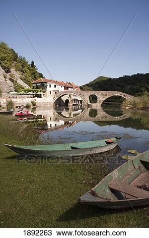 Boats With Old Stone Bridge In Distance View Large Photo Image Stock Image - Boats With Old Stone Bridge In Distance. Fotosearch
