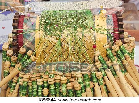 Picture - Bobbins, Thread And Pillow For Lace-Making. Fotosearch