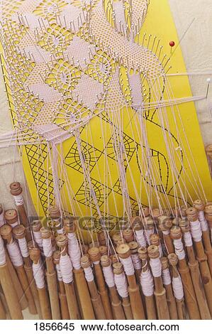 Stock Photography - Bobbins, Thread And Pillow For Lace-Making. Fotosearch
