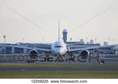 Stock Photography - Boeing 787-8 Dreamliner aircraft taxiing towards runway at Lester B. Pearson International Airport; Mississauga, Ontario. Fotosearch