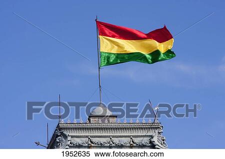 Stock Photography - Bolivian flag atop the Government Palace, currently Prefectura del Departamento de Chuquisaca, Sucre, Chuquisaca Department, Bolivia. Fotosearch