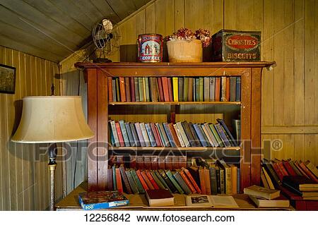 Stock Image - Bookshelf in Kilby General Store Museum at Kilby Historic Site; Harrison Mills, British Columbia, Canada. Fotosearch