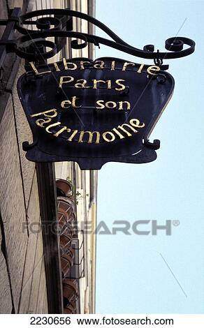 Stock Photograph - Bookshop sign on rue St Louis en I'Isle. Paris, France.. Fotosearch