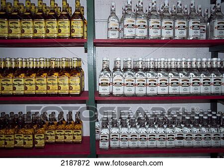 Stock Image - Bottles Of Mescal & Tequila Mexico City, Mexico. Fotosearch