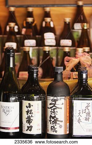 Stock Photograph - Bottles With Western And Chinese Script; New Zealand. Fotosearch