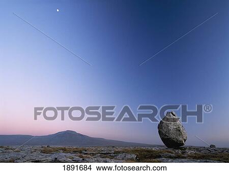 Boulder On Limestone Pavement At Dusk View Large Photo Image Picture - Boulder On Limestone Pavement At Dusk. Fotosearch