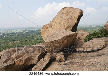 Boulder Outcrops On Arunachala Mountain In Tiruvannamalai, Tamil Nadu, India View Large Photo Image Stock Photograph - Boulder Outcrops On Arunachala Mountain In Tiruvannamalai, Tamil Nadu, India. Fotosearch