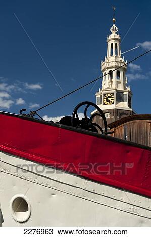 Bow of traditional Dutch barge with the Montelbaanstoren behind; Amsterdam, Holland View Large Photo Image Stock Image - Bow of traditional Dutch barge with the Montelbaanstoren behind; Amsterdam, Holland. Fotosearch
