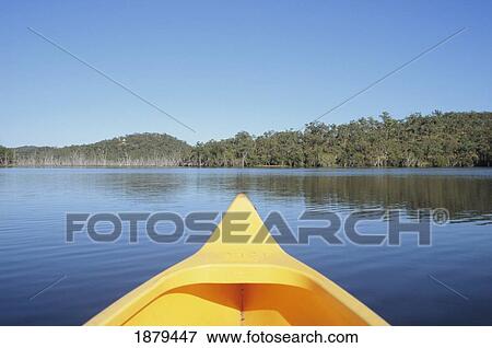 Stock Photo - Bow Of Yellow Boat On Lake Bennet. Fotosearch
