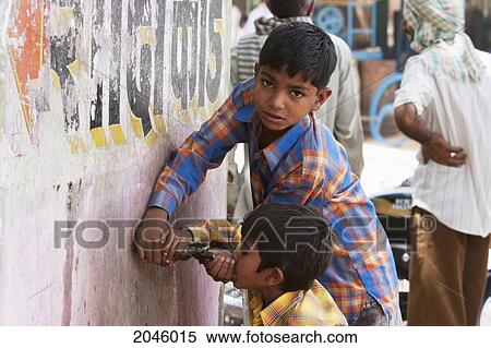 Stock Photography - Boy Drinking Water From A Tap, Nawalgarh, Rajasthan, India. Fotosearch