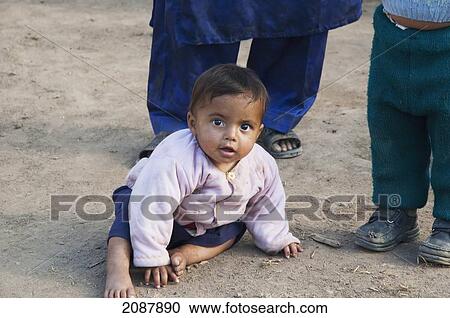 Stock Image - Boy In A Relief Camp After The 8 October 2005 Earthquake, Muzaffarabad, Azad Kashmir, Pakistan. Fotosearch