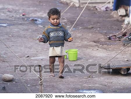 Stock Image - Boy In A Relief Camp After The 8 October 2005 Earthquake, Muzaffarabad, Azad Kashmir, Pakistan. Fotosearch