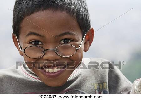 Boy In Antananarivo, Madagascar View Large Photo Image Stock Photo - Boy In Antananarivo, Madagascar. Fotosearch