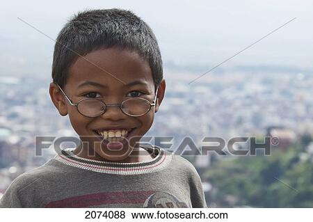Boy In Antananarivo, Madagascar View Large Photo Image Stock Photo - Boy In Antananarivo, Madagascar. Fotosearch