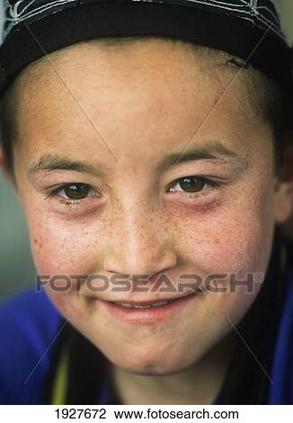 Stock Image - Boy In Kashgar, Portrait; Kashgar, Xinjiang, China. Fotosearch