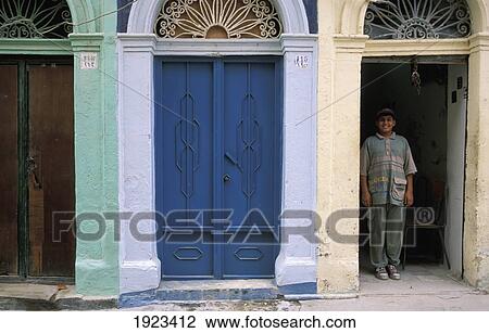 Boy In One Of Three Colourful Doorways View Large Photo Image Stock Image - Boy In One Of Three Colourful Doorways. Fotosearch