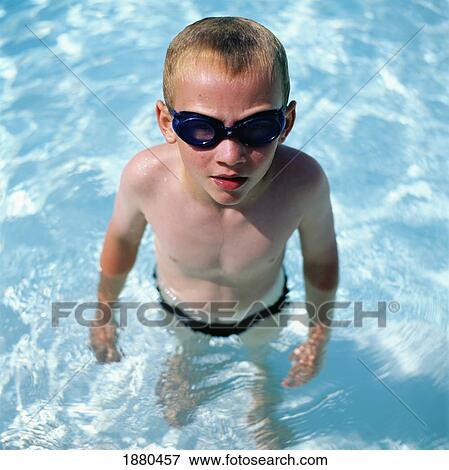 Stock Photo - Boy In Swimming Goggles In Swimming Pool. Fotosearch