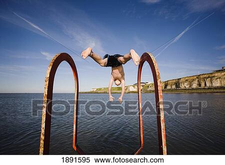 Boy Jumping To Swimming Pool View Large Photo Image Stock Photography - Boy Jumping To Swimming Pool. Fotosearch